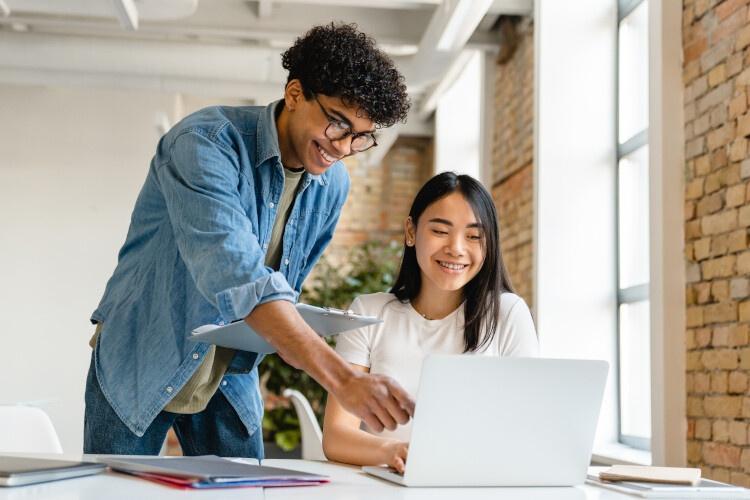 two-young-business-partners-working-together-in-wo-2022-07-06-1_p30897